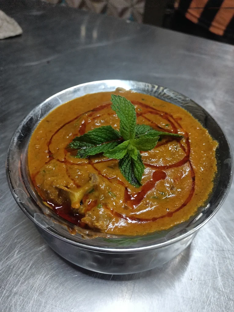 House special curry finished with fresh mint at Jannat